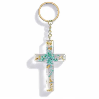 Porte-clé croix avec inclusions de fleurs - turquoise